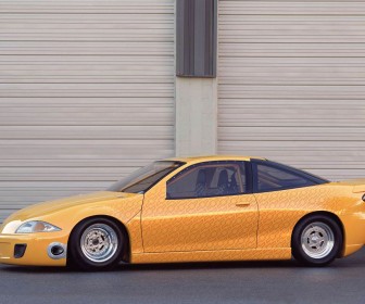 Chevrolet Cavalier Yellow Modified Side View Wallpaper